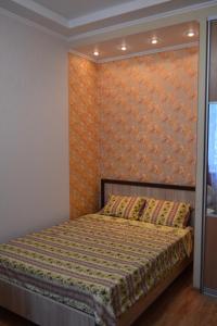 Łóżko lub łóżka w pokoju w obiekcie Apartment on Gogolya 23A