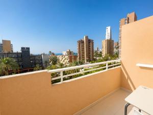 a balcony with a view of the city at Apartamentos El Faro By Mc in Benidorm