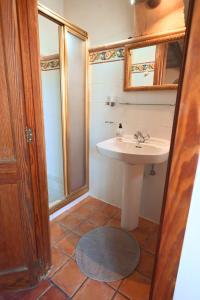 a bathroom with a sink and a shower at Finca Caballo Blanco in Montuiri +34 photos