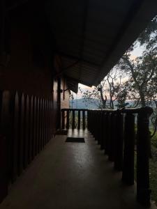 a hallway of a building with a fence at Saffron Eco Cottage in Ella +64 photos