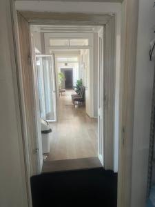 a hallway leading to a room with a living room at Tabacco in Obrenovac