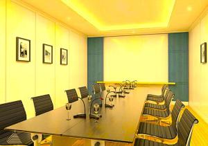 a conference room with a long table and chairs at Hotel Radhakunj Inn in Dhanbād