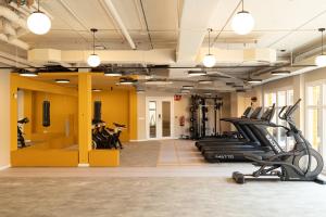 a gym with treadmills and elliptical machines at Canvas Valencia Burjassot in Burjassot +20 photos