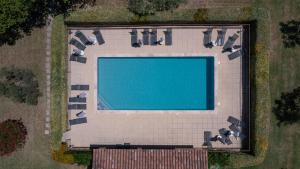 an overhead view of a building with a swimming pool at Mas de la Bimarde in Monteux