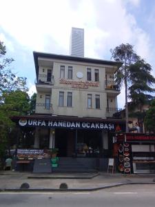 a store in front of a white building at Sunset Otel in Şile