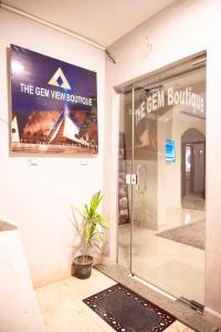 a sign for the gem view boutique on the door of a building at Gem View Grand Boutique in Cairo