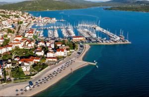 an aerial view of a harbor with boats in the water at Camp Oblica - parcela - empty plot in Pirovac