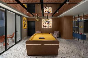 a room with a ping pong table in it at Aloft by Marriott Istanbul Karakoy in Istanbul +89 photos