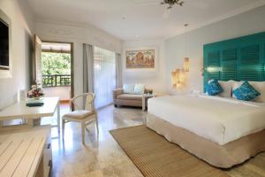 Postel nebo postele na pokoji v ubytování SOL by Meliá Benoa Bali All inclusive