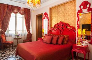 Łóżko lub łóżka w pokoju w obiekcie Cankaya Konaklari Hotel