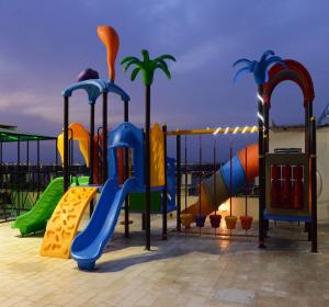 a playground with a slide and a slideintend at Hotel Rockfort View by Park Elanza in Tiruchirappalli