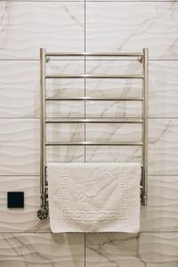 a towel rack in a bathroom with a towel at Полінарія Козятин in Kozyatyn +185 photos