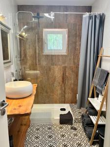 a bathroom with a sink and a shower at Off-grid Guest House in the Algarve in Portimão +37 photos