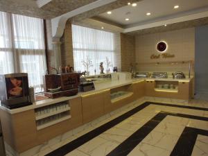 a large kitchen with aasteryasteryasteryasteryasteryasteryasteryasteryasteryasteryastery at Otel Nisa in Nevşehir +16 photos