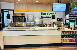 a eat fresh food counter in a store at Hotel Cloppenburg in Cloppenburg