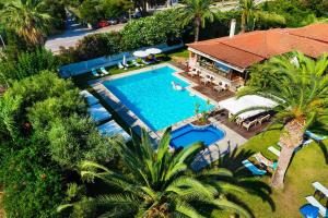 an overhead view of a swimming pool next to a house at Hotel Hanioti Village Spa in Hanioti +82 photos