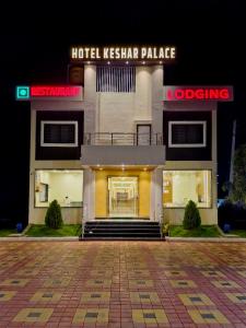a hotel star palace at night at Hotel Keshar Palace Shani Shingnapur in Sonai