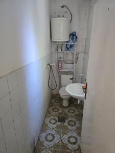 a small bathroom with a toilet and a sink at Lina in Dobrota +20 photos