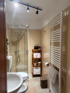 a bathroom with a toilet and a sink and a shower at Ai Sette Scalini in Larino +28 photos