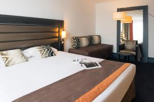 Postel nebo postele na pokoji v ubytování Mercure Lyon Centre - Gare Part Dieu