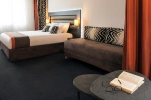 Postel nebo postele na pokoji v ubytování Mercure Lyon Centre - Gare Part Dieu