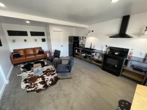 a living room with a couch and a table at Pik Pak in Marfa