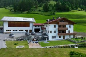 an aerial view of a large house with a yard at Ferienhof Blaas in Malles Venosta