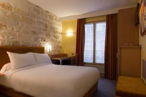 Postel nebo postele na pokoji v ubytování Hotel Danemark