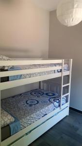 two sets of bunk beds in a room at Casa Alma Marbella in Marbella