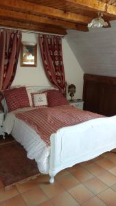 Postel nebo postele na pokoji v ubytování Chambre d'Hôtes "Au Vigneron"