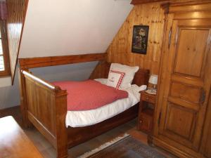 Postel nebo postele na pokoji v ubytování Chambre d'Hôtes "Au Vigneron"