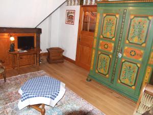 TV a/nebo společenská místnost v ubytování Chambre d'Hôtes "Au Vigneron"