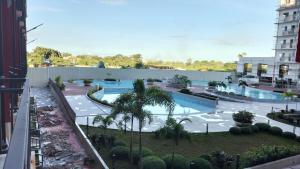 an overhead view of a swimming pool at a hotel at Mactan Airport 1BR Resort with Pool in Mactan Island