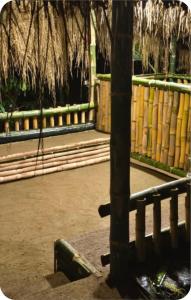 a tree sitting next to a wooden fence at The bharani villa in Pulpally +2 photos