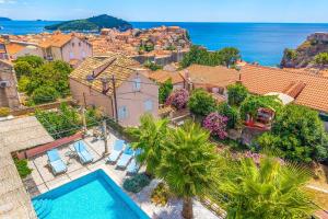 an aerial view of a house with a swimming pool at Villa Adriatic Pearl in Dubrovnik