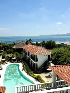 an aerial view of a resort with a swimming pool at Hotel Villa Toti in Santa Verónica