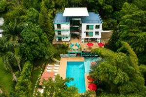 an aerial view of a villa with a swimming pool at HOTEL NATIVOS in La Vega