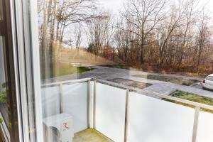 a window with a view of a street at Park & Town Apartment in Drawsko Pomorskie