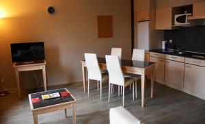 Kuchyň nebo kuchyňský kout v ubytování Ambassador Suites Antwerp