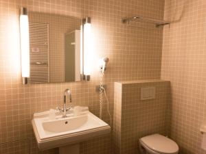 Koupelna v ubytování Hotel Villa Escale
