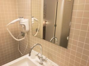 Koupelna v ubytování Hotel Villa Escale
