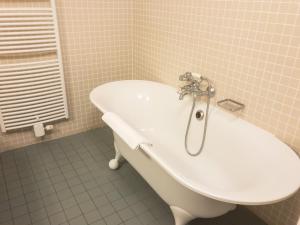 Koupelna v ubytování Hotel Villa Escale