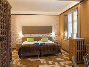 เตียงในห้องที่ Hotel Villa Escale