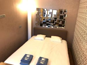 Postel nebo postele na pokoji v ubytování Hotel Villa Escale