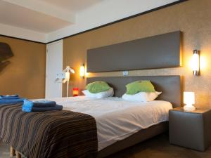 Postel nebo postele na pokoji v ubytování Hotel Villa Escale