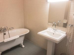 Koupelna v ubytování Hotel Villa Escale