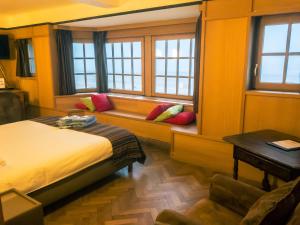 Postel nebo postele na pokoji v ubytování Hotel Villa Escale