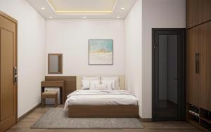 a bedroom with a bed in a room at Eco House Cat Ba in Hai Phong