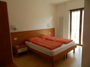 Un pat sau paturi într-o cameră la Villa Marina