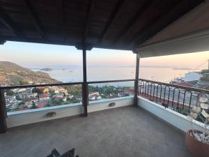 a balcony with a view of the ocean at Casa Gaia - Unit 1 in Glossa